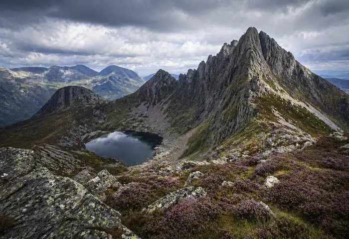 Scottish highland arête ridge with glacial tarn