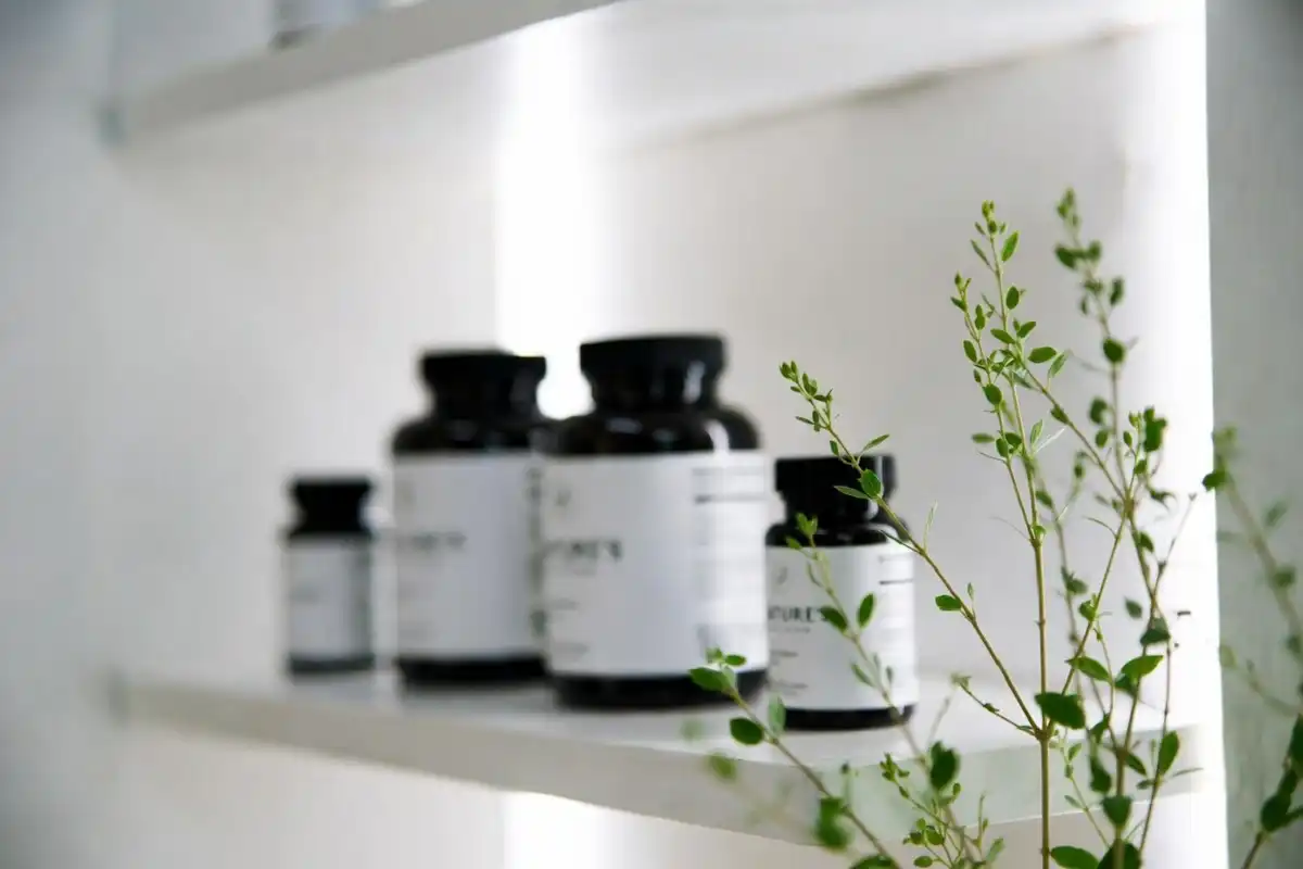 Several ashwagandha Nature Made supplement bottles arranged on a clean shelf
