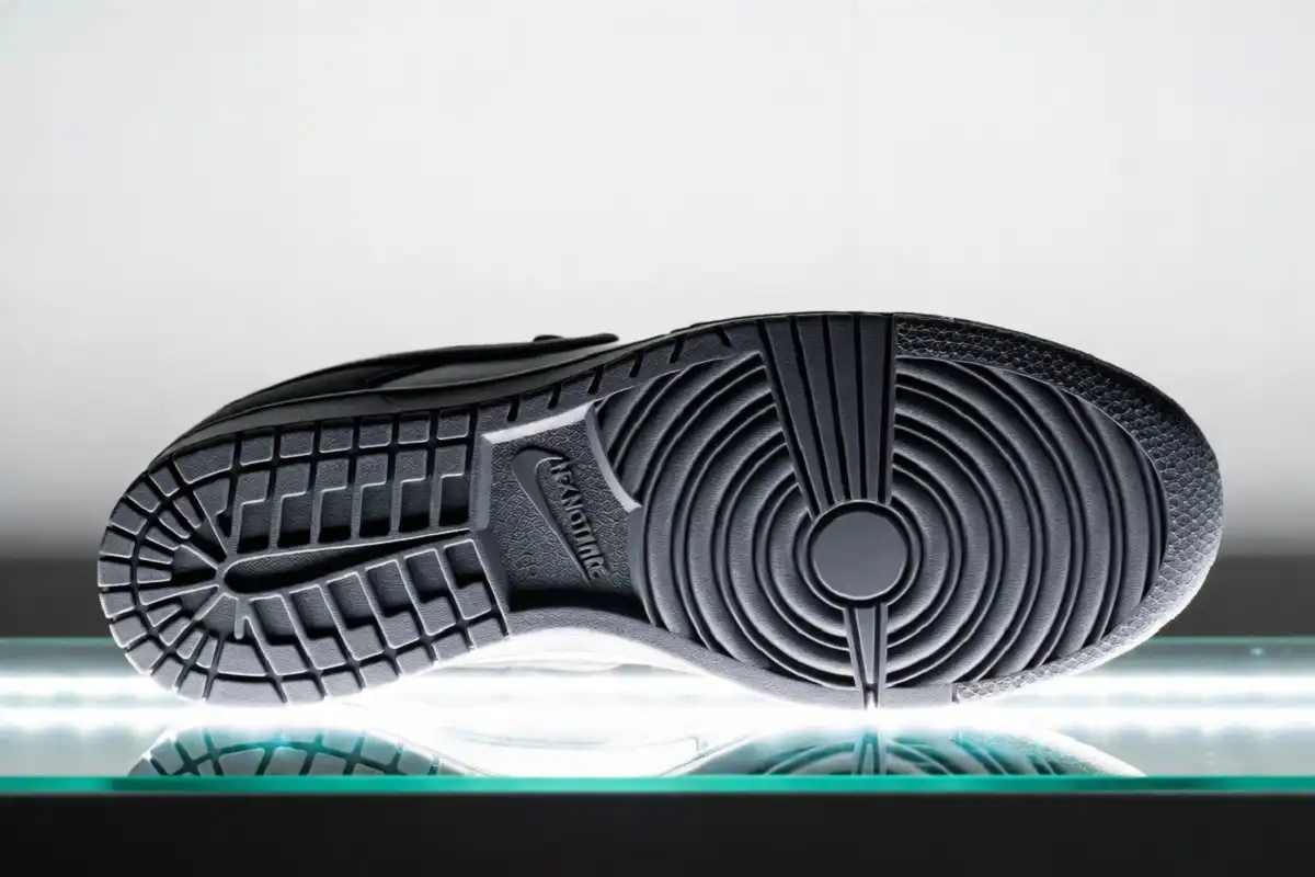 Nike Dunk Low Next Nature rubber outsole showing recycled traction pattern