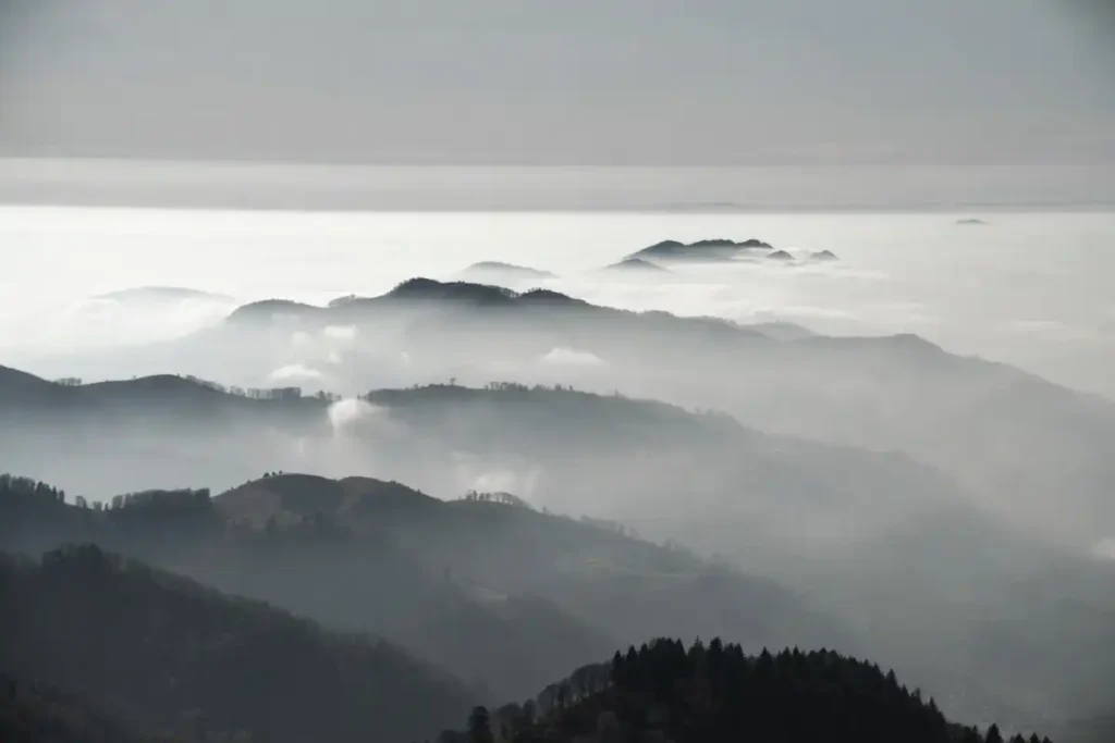 Mountain highland view with layered fog for nature photos 2026