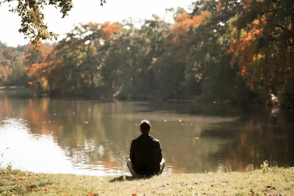 person by quiet lake for nature beauty captions article