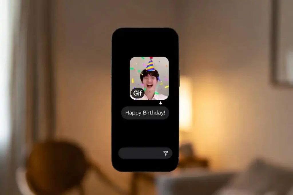 Phone showing a celebration GIF shared in a chat with confetti