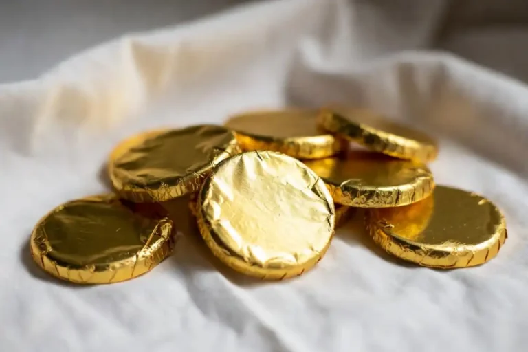 Team USA Chocolate Medals wrapped in gold foil arranged on a clean white surface