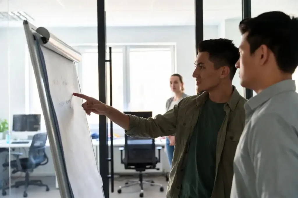 Team using happy Tuesday motivation quotes during a morning meeting