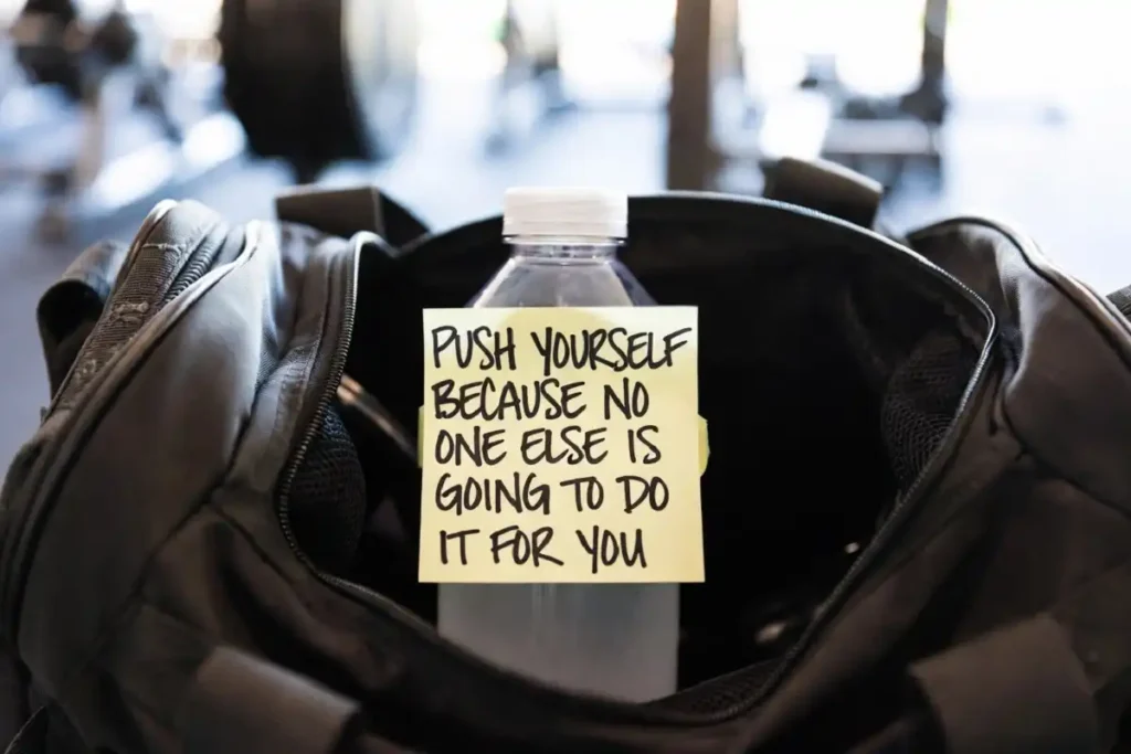 fitness motivation quotes for gym written on a sticky note for daily use